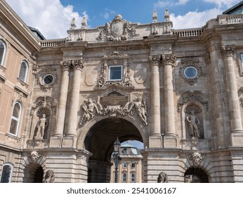 Historic Archway with Stone Sculptures of the Courtyard with Palace Entrance to the Buda Castle, Budapest, Hungary. - Powered by Shutterstock