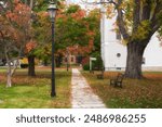 The historic area of Manchester Vermont during autumn on an overcast day. 