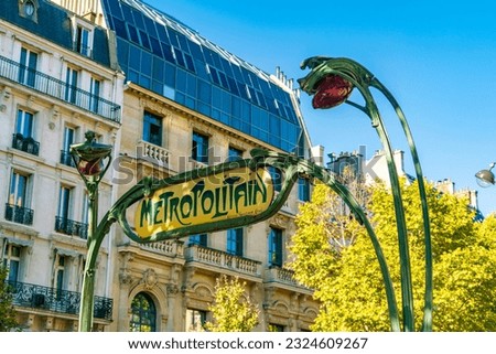 Historic Art Deco entrance metro sign in Paris, France