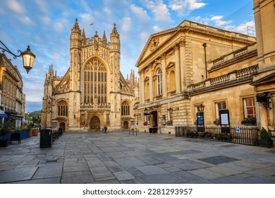 Historic Bath Abbey and roman baths building in Bath Old town center, England - Shutterstock ID 2281293957