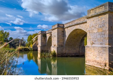 Historic Bridge over the River Pisuerga at Itero de la Vega on the Border of Burgos and Palencia Provinces along the Way of St James - Camino de Santiago