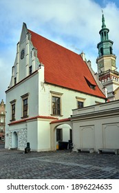 Historic building with red roofs and tower town hall on the market square in the city of Poznan

