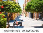 Historic buildings on a typical street in the old part of the coastal Denia town. Location place province of Alicante, Costa Blanca, Valencian Community, Spain, Europe. Discovery the beauty of earth.