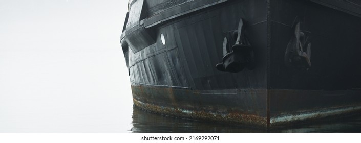 Historic Cargo Boat Moored To A Pier, In A Thick White Morning Fog, Close-up. Kiel, Germany. Transportation, Fishing, Sailing, Logistics, Industry, Traditional Craft, Past, History. Panoramic Image