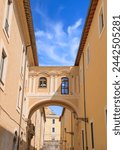 Historic center of Civitavecchia, Italy. View of the Old Hospital: the aerial passage that connects it between the two parts of the ancient hospital is suggestive.