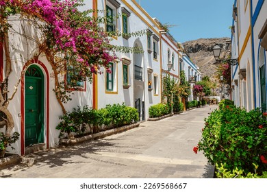historic center of puerto de mogan with lots of bougainvillea flowers, Canary Island