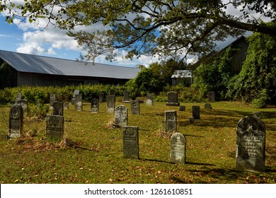 Historic Chadsey Cemetery And Old Sheep Barn At By Chadsey's Cairn Winery And Vineyard In Wellington, Prince Edward County, Ontario, Canada - September 30, 2017