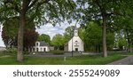 Historic church and rectory at Wilhelminaoord Maatschappij van weldadigheid Frederiksoord Netherlands. Unesco world heritage.