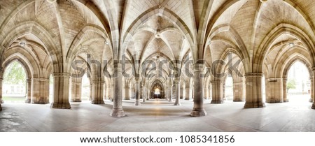 The historic Cloisters of Glasgow University. Panorama of the exterior walkway. Image taken from an outdoor public position.
