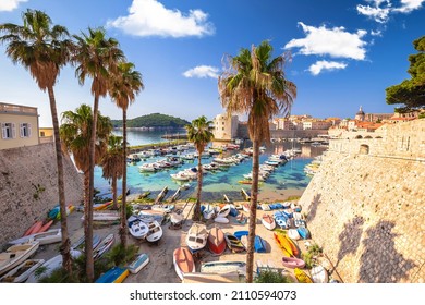 Historic Dubrovnik. Colorful harbor of Dubrovnik and stone defense walls view, travel destination in Dalmatia region of Croatia
