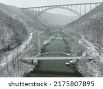 Historic Fayette Station Pennsylvania Truss Bridge + New River Gorge Corten Steel Arch Bridge - Snowy Winter Scene - New River Gorge National Park and Preserve - Fayetteville, West Virginia