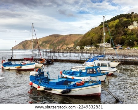 Historic fishing harbour at high tide, Lynmouth, Devon, England.