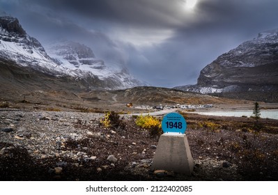 A Historic Glacier Post Showing The Receding Athabasca Glacier At The Columbia Ice Fields In Alberta Canada