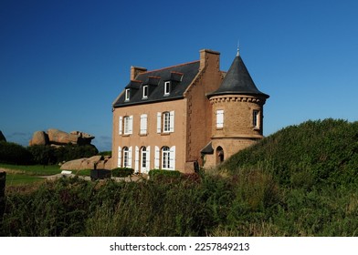Historic Gustave Eiffel House On The Beautiful Red Rock Coast In Ploumanach In Bretagne France On A Beautiful Sunny Summer Day With A Clear Blue Sky