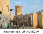 Historic Islamic style building in Al Fahidi Historical Neighbourhood (Al Bastakiya) at Dubai Creek in Dubai Old Village, city of Dubai, United Arab Emirates UAE. 