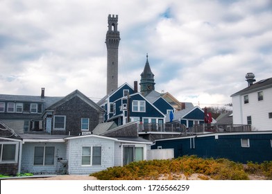 The Historic Landmark Pilgrim Monument And Town Hall Rising Above Provincetown Massachusetts On A New England Autumn Day.