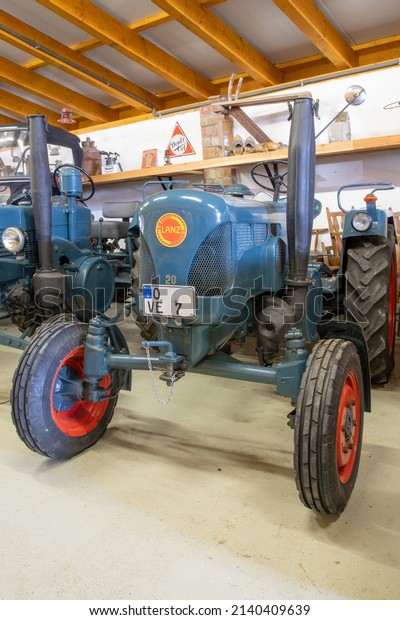 Historic Lanz Bulldog tractor in a\
farm market in Münster, Westphalia, Germany,\
03-14-2022