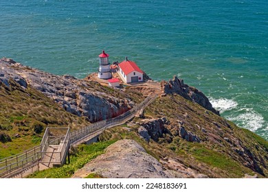 Historic Lighthouse on a Rocky Shore at Point Reyes National Seashore in California - Shutterstock ID 2248183691
