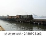 The historic Native Jetty Bridge in Karachi features an iconic railway track that has served the port city for decades. This landmark is an important part of Karachi