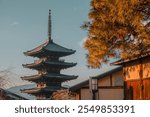 Hōkan-ji, historic pagoda, ancient architecture, tranquil atmosphere, Kyoto’s charm.