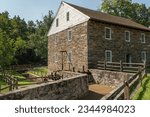 Historic Peirce Mill with mill race, built in 1829. The mill ground corn, wheat, and rye until 1897. Rock Creek Park, Washington, DC
