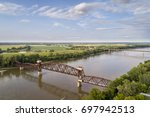 Historic railroad Katy Bridge over Missouri River at Boonville with a lifted midsection and visitor observation deck  - aerial view