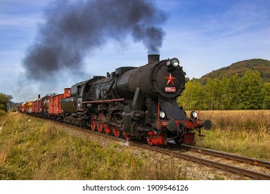 Historic Retro Steam Locomotive With Freight Train