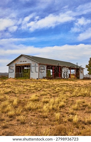 Historic Route 66 Barn Rustic Sign and Grassland in Arizona