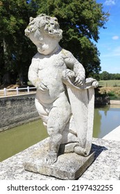 Historic Sculpture In A Baroque Garden In Normandy, France