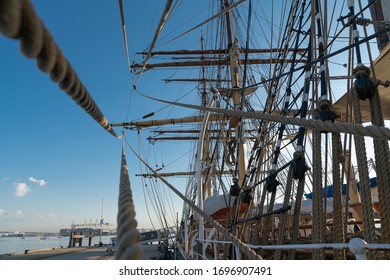 Historic Square Rig Sailing Ship Rigging With Leading Lines And Ropes In Selective Focus  At Dock At Williamstown.