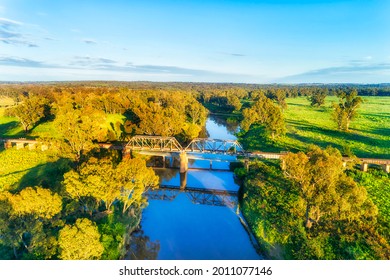 Historic Steel Railway Bridge Across Macquarie River In Dubbo Rural Regional Town Of Australia - Scenic Aerial View.