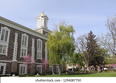 Historic Stone Tabernacle In Cache County Utah With Trees Next To It