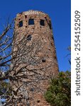 Historic Stone Tower Against Blue Sky