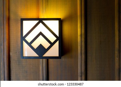 Historic Timberline Lodge Light Fixtures On An Old Wooden Wall In A Hallway.