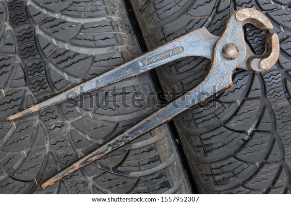 Historic tools on a tire
background.