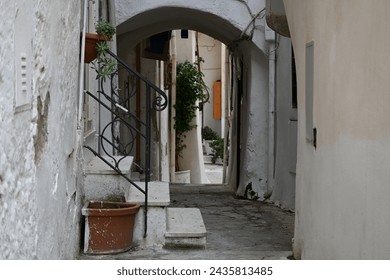 Historic town of Sperlonga Italy with very beautiful beach, sea, panorama, small harbor and very narrow alley, winter time shot - Powered by Shutterstock