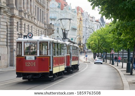 Similar – Image, Stock Photo Prague city historical streetcar driving through picture