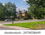 A historic victorian style building in the city of Montpelier Vermont on a sunny summer day.