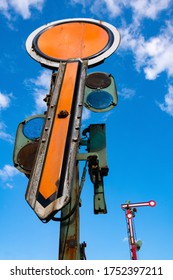 Historic Vintage Railway Signals With Colored Steel Plates On A Shut Down Station In Halver Sauerland Germany With Mechanical Functions And Lights On A Sunny Day