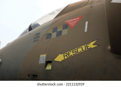 Historic Vintage Retired World War Fighter Plane For Air To Air Combat With Rustic Body Panels, Weathered Paint Job And Labels