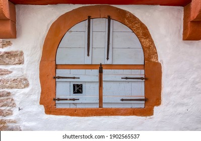 historic window with closed shutter seen in Wertheim am Main in Southern Germany