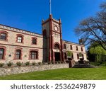 The historic Yalumba Winery in the Barossa Valley, Australia, with its clock tower and red-brick accents. Established in 1849, Yalumba is one of Australia’s oldest family-owned wineries.