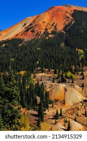 The historic Yankee Girl silver mine and surrounding Red Mountains from the "Million Dollar Highway," part of the San Juan Skyway scenic drive between Ouray and Silverton, Colorado, USA
