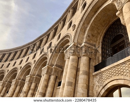 Historical architecture, facade of building with arches and columns on Republic Square in Yerevan, Armenia