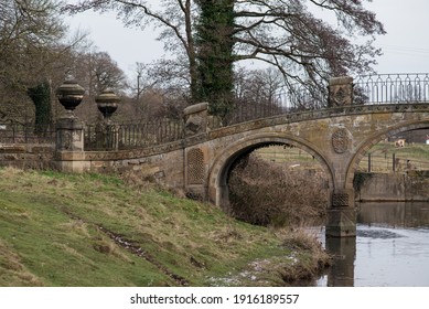 Historical Bridge Above The River. Dam Head Bridge At Bretton Hall. 