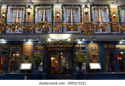 The Historical Cafe Procope Decorated For Christmas 2021 In The Evening , Paris, France.