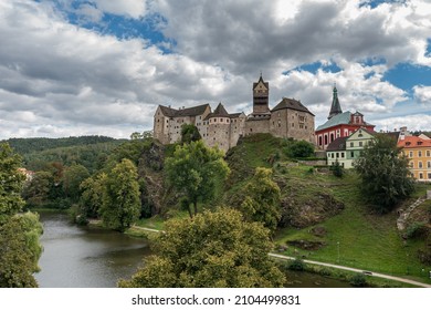 Historical castle Loket with cloudy sky in Western Bohemia, Sokolov district, Czech republic - Shutterstock ID 2104499831