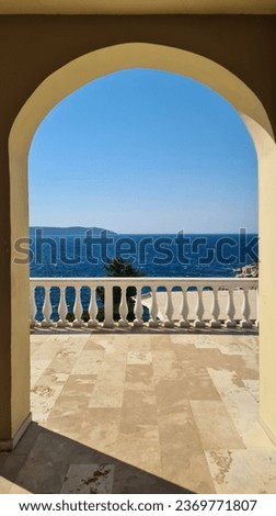 Historical Corfu house with a seaview. Architecture with a seaview. Old portico and balcony over the sea. Balcony with a sea view.