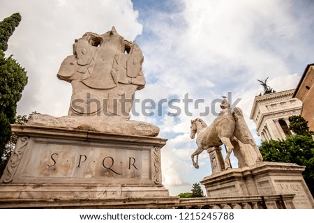  Historical ensemble at the Capitoline Hill in Rome. A Latin inscription beginning with SPQR - 