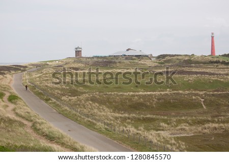 Similar – Foto Bild Leuchtturm auf der Düne